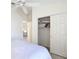 Bedroom with closet and en-suite bathroom access at 1008 Jackson St, The Villages, FL 32162