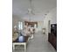 Open-concept living room with tile floors at 1008 Jackson St, The Villages, FL 32162