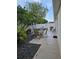 Outdoor patio featuring garden, seating area, landscaping, and a serene space for relaxation at 1008 Jackson St, The Villages, FL 32162