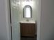 Bathroom featuring wood vanity at 1021 Golfside Ct, Kissimmee, FL 34741