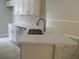 Bright kitchen island featuring stainless steel appliances and stone countertops at 1021 Golfside Ct, Kissimmee, FL 34741