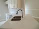 Bright kitchen featuring stainless steel appliances and stone countertops at 1021 Golfside Ct, Kissimmee, FL 34741