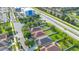 A detailed aerial shot showcases the home and surrounding neighborhood at 10580 Moss Rose Way, Orlando, FL 32832