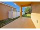 Covered patio overlooking fenced yard with green grass, great for outdoor entertaining at 10580 Moss Rose Way, Orlando, FL 32832