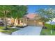 Charming single-Gathering home with well-maintained landscaping and a paved driveway leading to a two-car garage at 10580 Moss Rose Way, Orlando, FL 32832