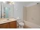 A full bathroom with a shower and bathtub combo at 1130 Burland Cir, Winter Garden, FL 34787