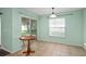 Dining area with sliding glass doors to the backyard at 1130 Burland Cir, Winter Garden, FL 34787