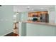An eat-in kitchen with wood cabinets and stainless steel appliances at 1130 Burland Cir, Winter Garden, FL 34787
