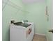 Well-lit laundry room with newer washing machine and dryer at 1130 Burland Cir, Winter Garden, FL 34787