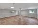 Spacious basement with tiled floors, large windows, and easy access at 1310 Coletta Dr, Orlando, FL 32807