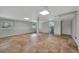 Large basement with tiled floors and a utility area with laundry hookups at 1310 Coletta Dr, Orlando, FL 32807