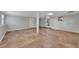 Tiled basement with support beams and multiple entryways at 1310 Coletta Dr, Orlando, FL 32807