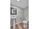 Cozy bathroom features tile flooring, sleek fixtures and contemporary design at 1310 Coletta Dr, Orlando, FL 32807