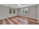 Bright bedroom with hardwood floors, and a pair of windows for ample natural light at 1310 Coletta Dr, Orlando, FL 32807