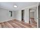 Bedroom view showing closet and doorway, light gray walls and hardwood floors at 1310 Coletta Dr, Orlando, FL 32807