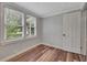Charming bedroom filled with natural light and views of surrounding greenery at 1310 Coletta Dr, Orlando, FL 32807