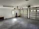 The garage is large and contains two garage doors at 13208 Massachusetts Ave, Astatula, FL 34705