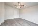 Neutral bedroom featuring a ceiling fan and wood-look floors at 1373 Burnley Ct, Kissimmee, FL 34758