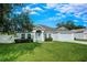 Charming single-story home with well-manicured lawn and inviting front entrance at 1373 Burnley Ct, Kissimmee, FL 34758