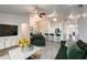 Comfortable living room features modern decor, a ceiling fan, and plenty of natural light at 1373 Burnley Ct, Kissimmee, FL 34758