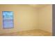 Spacious bedroom with tile flooring, large window, and neutral paint at 1524 Crawford Dr, Apopka, FL 32703
