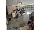 Unfinished garage space with cluttered storage, ready to be organized or renovated at 1524 Crawford Dr, Apopka, FL 32703