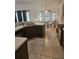 Functional kitchen with wooden cabinets and tile flooring at 1524 Crawford Dr, Apopka, FL 32703