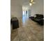 Spacious living room featuring tile floors and contemporary furnishings at 1524 Crawford Dr, Apopka, FL 32703