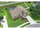 Beautiful home featuring a screened pool, mature trees, and a well-maintained lawn in a desirable neighborhood at 1546 Royal Cir, Apopka, FL 32703