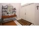 Foyer with white double door entrance and table with mirror and space for decor at 1546 Royal Cir, Apopka, FL 32703