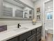 Stylish bathroom with elegant vanity, quartz counters, and updated fixtures offering a serene and functional space at 1795 Markham Glen Cir, Longwood, FL 32779