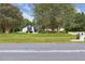 Charming home with lush landscaping and mature trees, offering a serene and private setting at 1795 Markham Glen Cir, Longwood, FL 32779