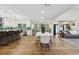 Open-concept living space with modern kitchen, dining area, and cozy seating offers a versatile and inviting atmosphere at 1795 Markham Glen Cir, Longwood, FL 32779
