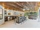 Outdoor kitchen and bar area features a spacious countertop, perfect for entertaining near the hot tub at 1795 Markham Glen Cir, Longwood, FL 32779