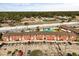 Apartment complex features brick facades, ample parking, and a community pool at 2250 S Palmetto Ave # I-11, Daytona Beach, FL 32119