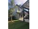 Beautiful side view of gray home with palm trees and nice landscaping at 2325 Audley St, Oviedo, FL 32765