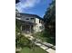 Two-story home features professionally landscaped front yard and modern design at 2325 Audley St, Oviedo, FL 32765