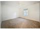 This is a bedroom with carpet floors, a ceiling fan, and natural light at 2353 Kingscrest Cir, Apopka, FL 32712