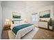 Bright bedroom featuring fresh white walls, a plush rug, and stylish coastal decor at 2353 Kingscrest Cir, Apopka, FL 32712
