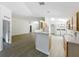 Efficient kitchen with bright appliances, and an archway that goes to the laundry room at 2353 Kingscrest Cir, Apopka, FL 32712