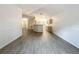 Bright and airy living space, with archway to the front and kitchen visible at 2353 Kingscrest Cir, Apopka, FL 32712