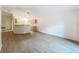 Inviting living area with an open floor plan that seamlessly connects the kitchen at 2353 Kingscrest Cir, Apopka, FL 32712