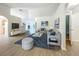 Spacious living room with vaulted ceilings, stylish decor, and an open layout for entertaining at 2353 Kingscrest Cir, Apopka, FL 32712