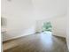 Spacious living room with sliding glass doors to a private outdoor patio at 2353 Kingscrest Cir, Apopka, FL 32712