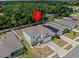 Aerial view of the property pinpointed within the surrounding neighborhood at 253 Fiddlewood Ct, Davenport, FL 33837
