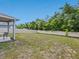 Enjoy the spacious backyard with lush green grass, perfect for outdoor activities and relaxation at 253 Fiddlewood Ct, Davenport, FL 33837
