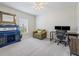 Bedroom showcasing an accent chair, desk with computer and decorative furniture at 253 Fiddlewood Ct, Davenport, FL 33837