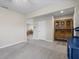 Open living space featuring tile flooring, a dining room and a cabinet at 253 Fiddlewood Ct, Davenport, FL 33837