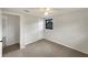 This bedroom features neutral walls and carpet and one window at 2575 King Ave, Auburndale, FL 33823