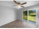 Bright dining room with tile floor and a sliding door to the outdoors at 2575 King Ave, Auburndale, FL 33823